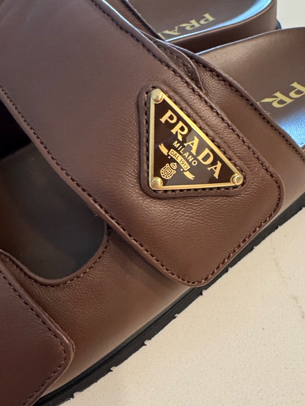 Women’s Luxury Prada Brown Leather Dual-Strap Slide Sandal with Gold Logo - Picture 11 of 14